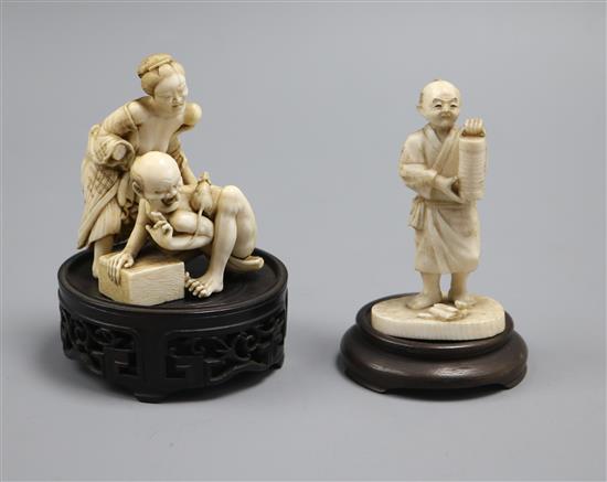 A good Japanese ivory okimono of the Rat Catcher and a figure of a man, both Meiji period